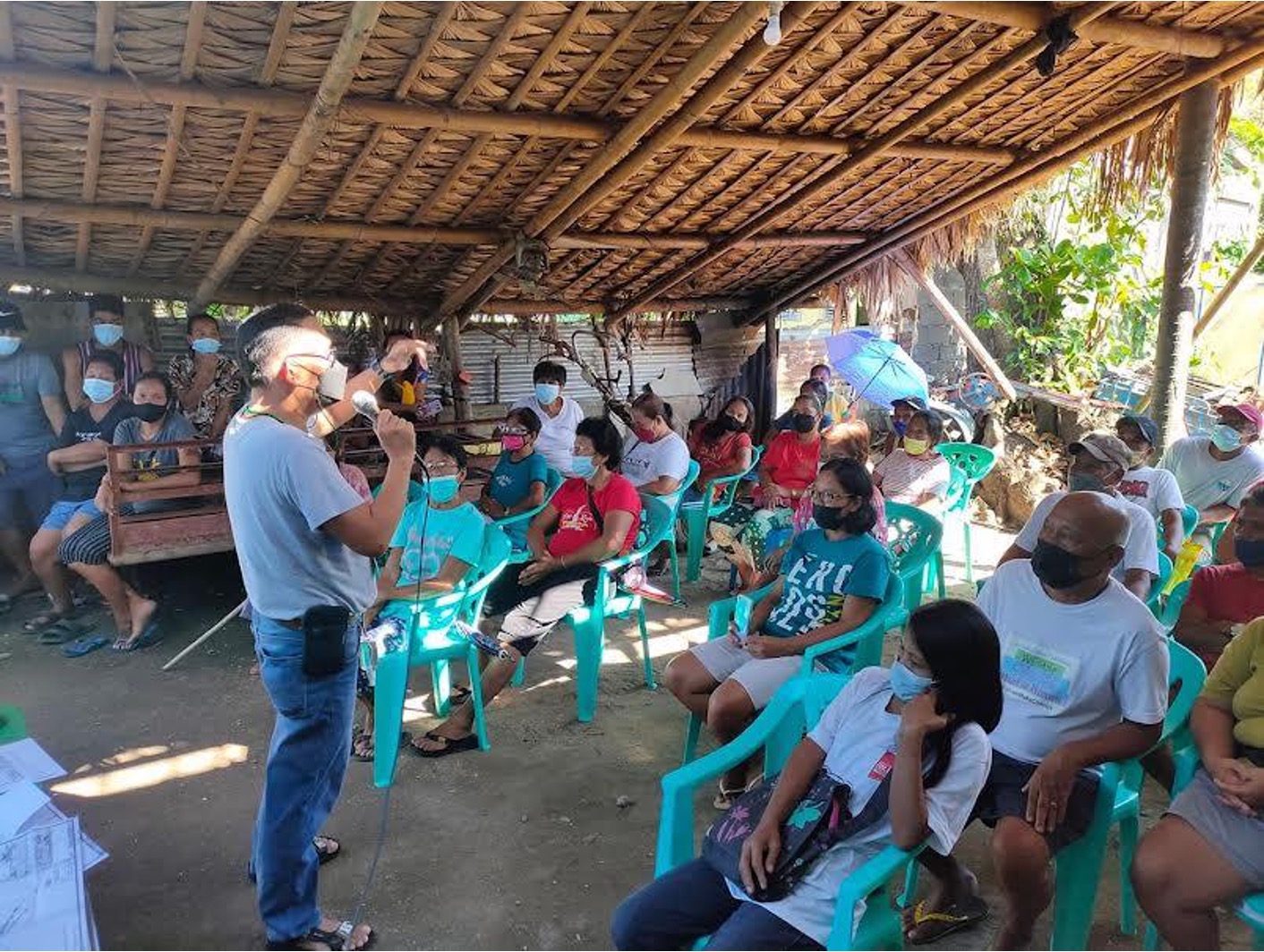 The
Legal Officer and team leader of the field validation team conducts community orientation on
Project SPLIT in Sorsogon Province. © Department of Agrarian Reform blog/DAR-Philippines_02.jpg